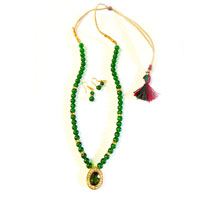 Necklace with pendant using green color beads