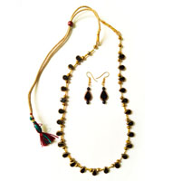 Necklace with heart shaped black color beads